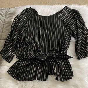 Cute little black/gold metallic blouse from Express